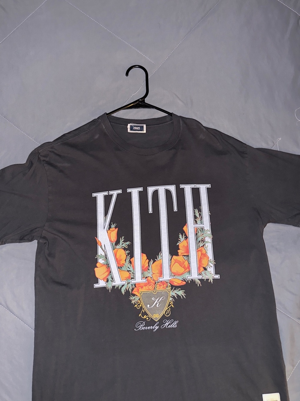 Kith Black Tee with Orange Floral Logo